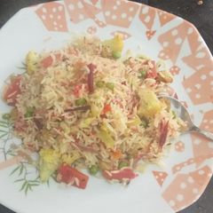 A picture of Veg pulav with beetroot.