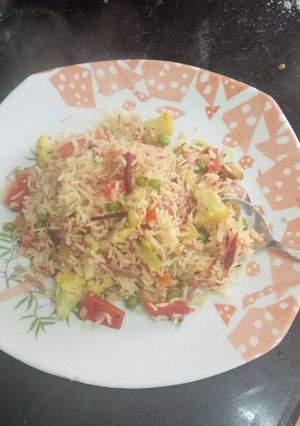 A picture of Veg pulav with beetroot.