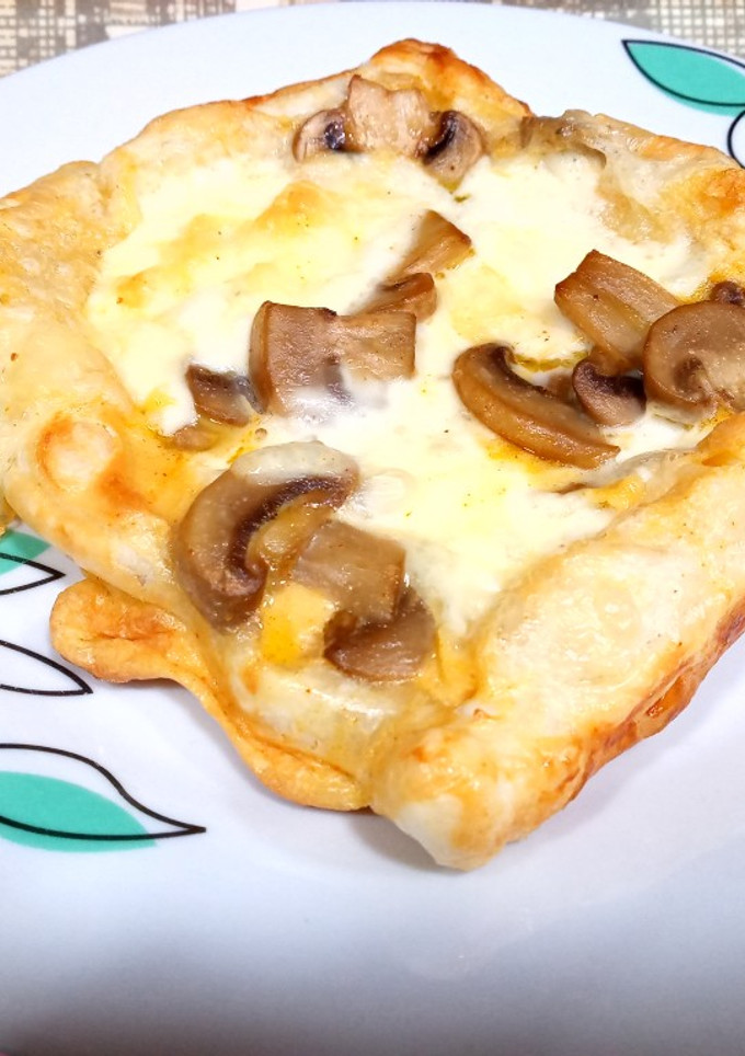 Una foto de Hojaldre de champiñones y queso tetilla