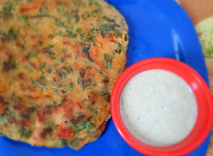 A picture of Oats & Rice flour vegetable chila.