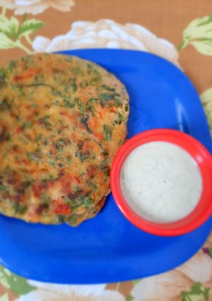 A picture of Oats & Rice flour vegetable chila.