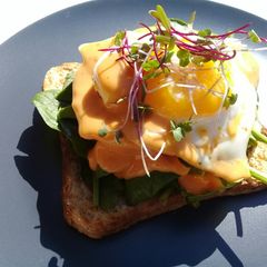 A picture of Open face sandwich breakfast.