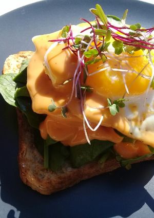 A picture of Open face sandwich breakfast.