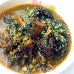 A picture of Uziza soup with periwrinkle and dry fish.