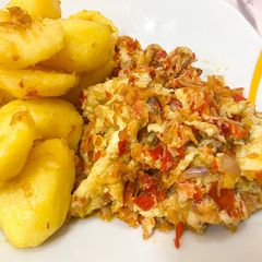 A picture of Pan fry Irish potato with Scrambled egg sauce.
