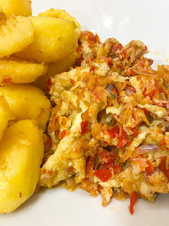 A picture of Pan fry Irish potato with Scrambled egg sauce.