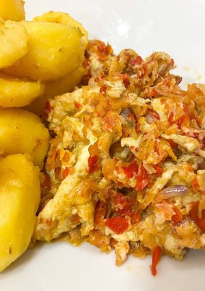 A picture of Pan fry Irish potato with Scrambled egg sauce.