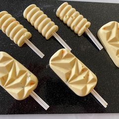 A picture of Mango and Passion Fruit Shrikhand Popsicles.