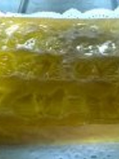 Una foto de Coca de naranja