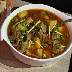 A picture of Aloo gosht.