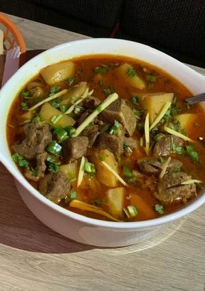 A picture of Aloo gosht.