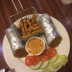 Veg Kathi Roll.Masala Fries.Makhani Gravy.With Salad A picture of Veg Kathi Roll.Masala Fries.Makhani Gravy.With Salad.