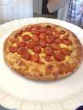 Pizza de tomate cereja e catupiry