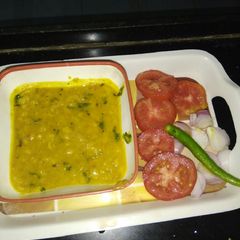 A picture of Dal fry with double tadka.