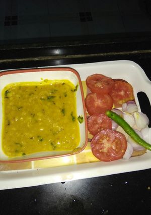 A picture of Dal fry with double tadka.