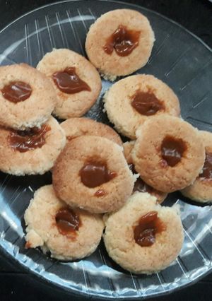 Una foto de Ojitos de coco con dulce de leche