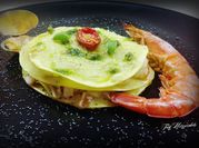 Una foto di vongole gamberi