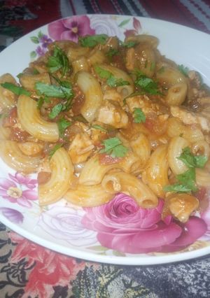 A picture of Tomato Tikka Macaroni.