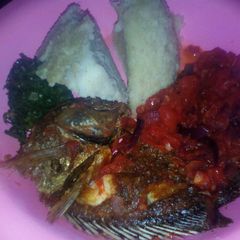 A picture of Ugali and fish.