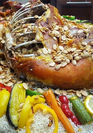 صورة لوصفة ذبيحه مندي محشي رز عنبر https://youtube.com/channel/