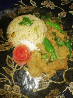 A picture of Turnip Masala with Vegetable rice.