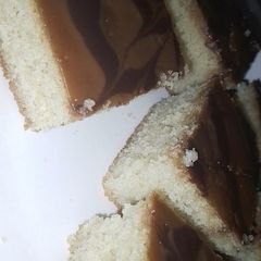 A picture of Parle - G and Choco rings Basbusa (بسبوسة).