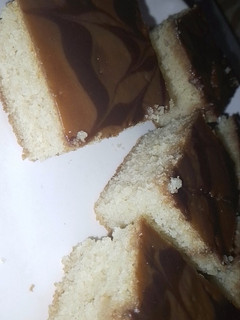 A picture of Parle - G and Choco rings Basbusa (بسبوسة).