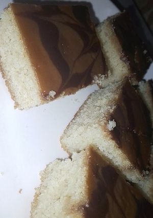 A picture of Parle - G and Choco rings Basbusa (بسبوسة).