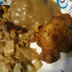 Porkchops, Gravy, with Cashew Pork Dressing A picture of Porkchops, Gravy, with Cashew Pork Dressing.