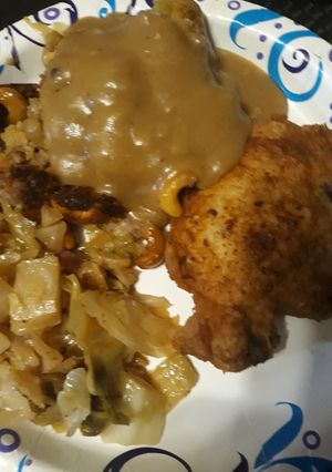 A picture of Porkchops, Gravy, with Cashew Pork Dressing.