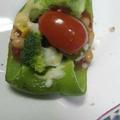 A picture of Baked Stuffed Capsicum Pizza.