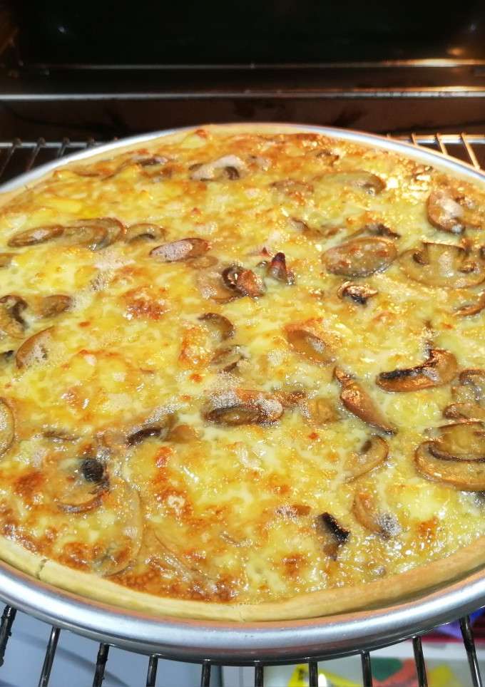 Una foto de Quiche de champiñones y queso camembert