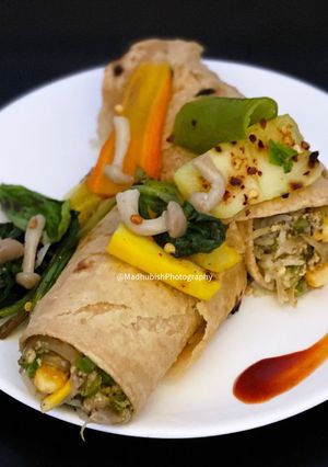 A picture of Cottage Cheese, corn, pepper burritos.