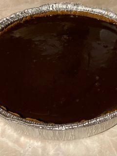 Una foto de Cheesecake de dulce de leche y chocolate
