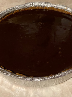 Una foto de Cheesecake de dulce de leche y chocolate