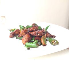A picture of Pork With Green Chili Pepper In Soy Sauce.