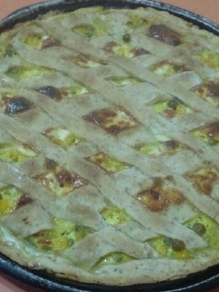 Una foto de Tarta de choclo y arvejas con masa de harina integral