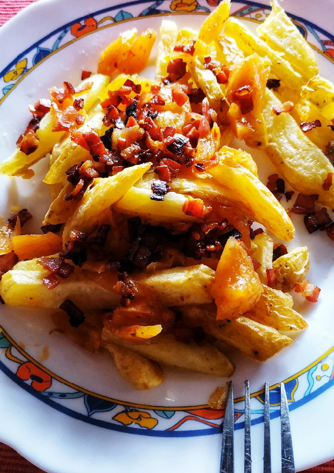 Una foto de Patatas con cheddar y bacon!