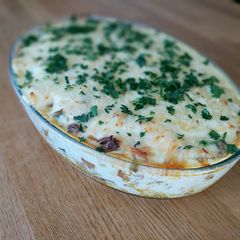 A picture of Mousaka with bechamel sauce.