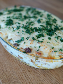 A picture of Mousaka with bechamel sauce.