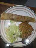 Chapati served with yellow beans and steamed cabbages