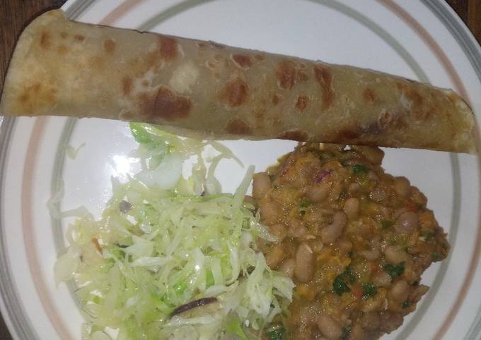 Chapati served with yellow beans and steamed cabbages