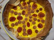 Una foto di pizza rustica