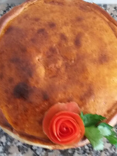 Una foto de Torta de hojas de remolacha y ricotta