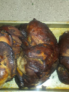 A picture of Pecan smoked jerk chicken.