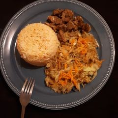 A picture of Wet fried mutton served with veges.