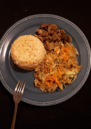 A picture of Wet fried mutton served with veges.