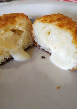 Una foto de Torrejitas de arroz rellenas de queso