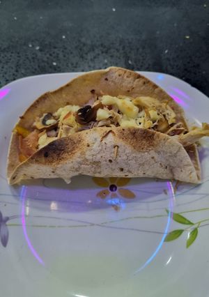 Una foto de Taquitos de pollo y tocino