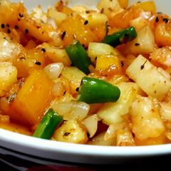 Stir fried Pumpkin with Potatoes/Aloo Kumro Chechki A picture of Stir fried Pumpkin with Potatoes/Aloo Kumro Chechki.